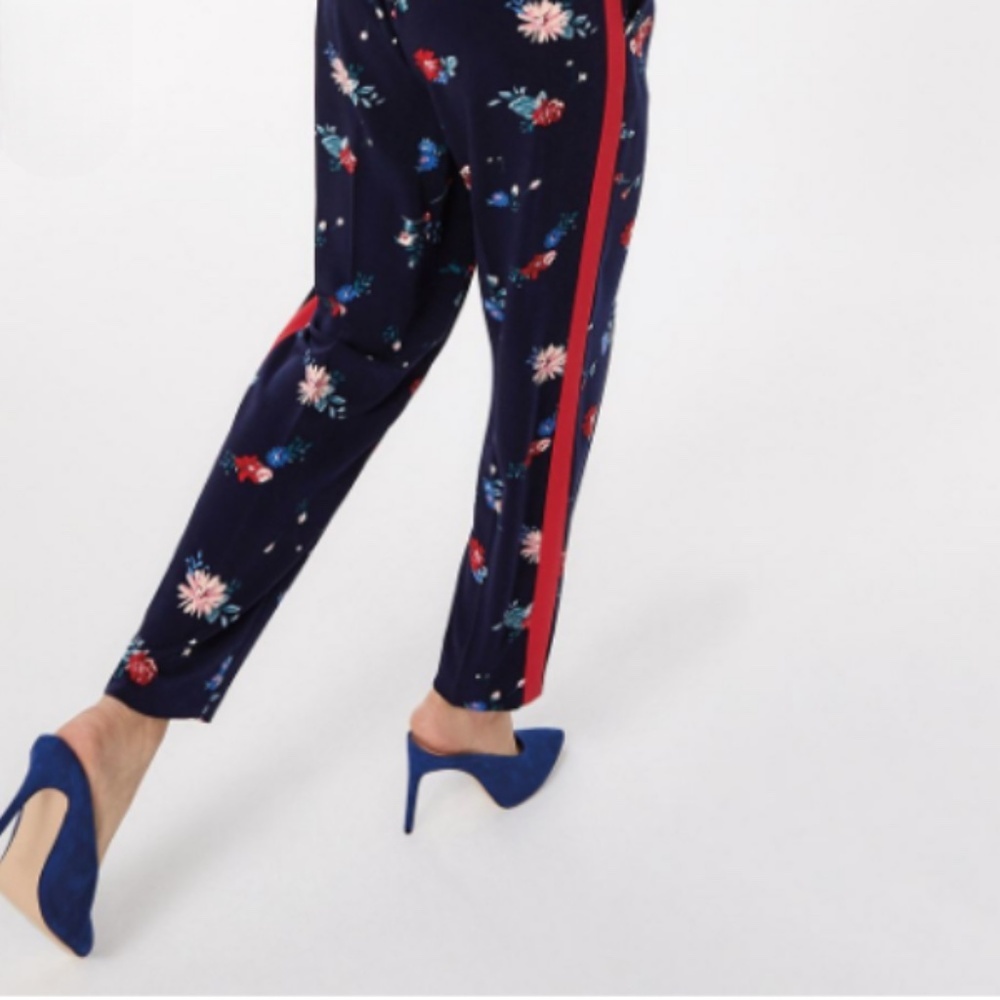 REITMANS Navy floral pants with sides red stripes